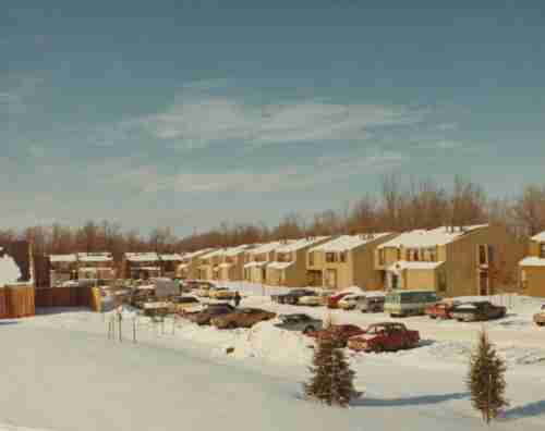 An archive photo of the Ravines Apartments and parking lot in the Winter